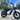Freego Mini E-Bike - 800 Watts electric motorcycle for young riders, shown on city street, compact and lightweight design.