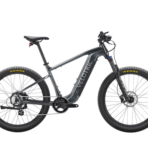 The Velotric Summit 1 electric mountain bike in black, featuring a 750W motor and 70 miles of range with pedal assist.