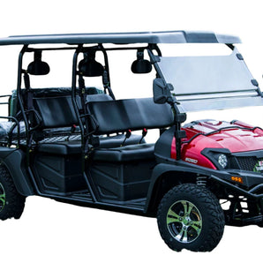 TrailMaster Taurus 80ED-GV 6-seat electric golf cart with extended roof, featuring front-facing and convertible rear cargo seating.