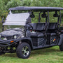 TrailMaster Taurus 80ED-U 4-Seat Electric Golf Cart with 72V Motor and Aluminum Wheels, parked on grass